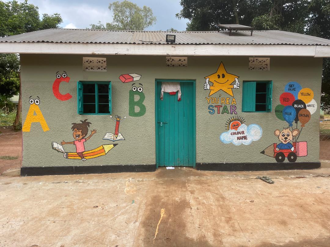 Kakuc Day Care classroom entrance decorated with letters, colors, and playful characters