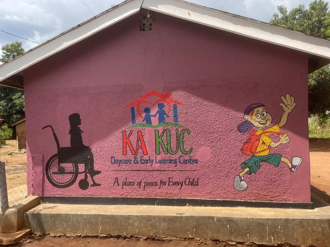 Accessible Kakuc Day Care building painted with inclusive children’s murals